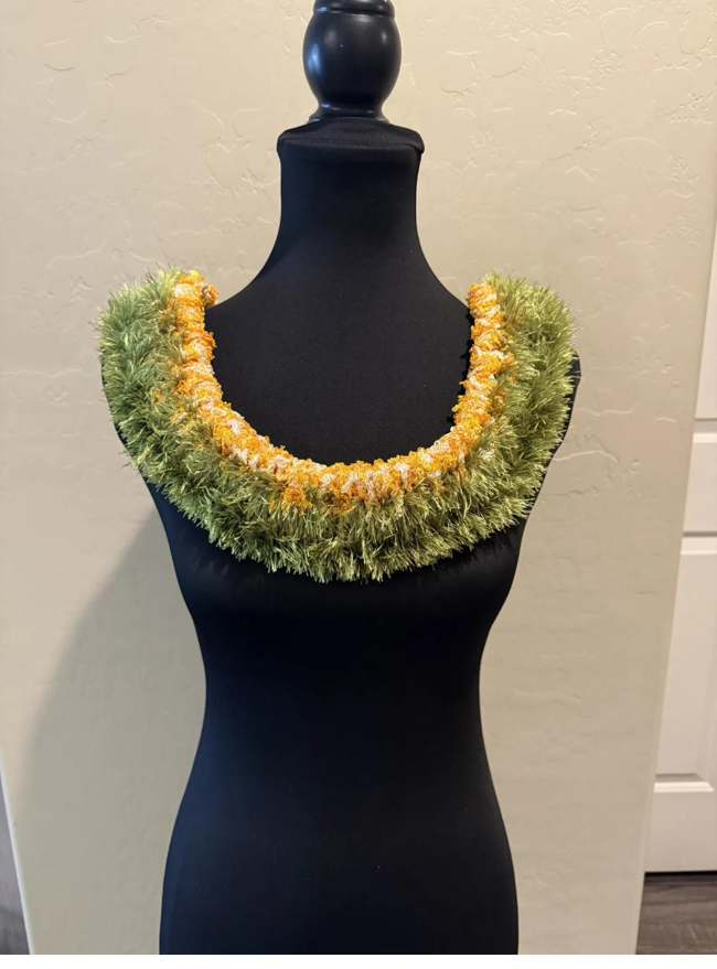 Blue crochet lei with rosette clusters